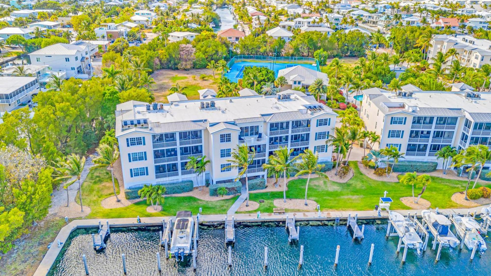 Ocean View Penthouse Retreat Amenities: Tennis Court Heated Pool Vista Key Two Islamorada